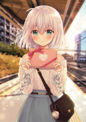 Rule 34 | 1girl, ahoge, aran sweater, bag, bag charm, blue skirt, blurry, blurry background, blush, box, braid, cable knit, charm (object), commentary request, depth of field, english text, gift, gift box, green eyes, green ribbon, grey nails, hair between eyes, hair ribbon, hands up, happy valentine, highres, holding, holding gift, long sleeves, looking at viewer, nail polish, off-shoulder sweater, off shoulder, original, outdoors, parted lips, pleated skirt, railroad tracks, ribbon, sato ame, shoulder bag, signature, silver hair, skirt, sleeves past wrists, solo, sweater, train station, train station platform, valentine, white sweater