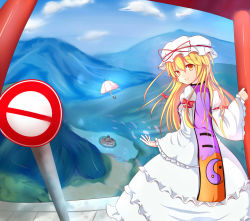 Rule 34 | 1girl, arm up, blonde hair, blue sky, blurry, bow, cloud, day, depth of field, dress, female focus, from behind, hair bow, hat, hat ribbon, highres, island, lake, long hair, long sleeves, looking at viewer, looking back, mountain, open hand, parasol, ribbon, road sign, saka ro, scarlet devil mansion, sign, sky, smile, solo, standing, tabard, torii, touhou, umbrella, white dress, wide sleeves, yakumo yukari, yellow eyes, yin yang