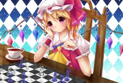 Rule 34 | 1girl, argyle, argyle background, argyle clothes, aru0607, ascot, blonde hair, board game, chair, chess, chess piece, chessboard, cup, dutch angle, elbow rest, expressionless, flandre scarlet, gradient background, hat, head rest, light particles, looking at viewer, mob cap, puffy short sleeves, puffy sleeves, red eyes, saucer, short hair, short sleeves, side ponytail, sitting, solo, table, teacup, touhou, wings, wrist cuffs