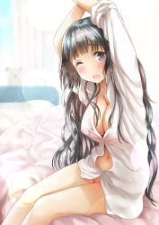 Rule 34 | 1girl, arms up, bedside, black hair, blunt bangs, blush, breasts, brown eyes, cleavage, collarbone, collared shirt, covered erect nipples, highres, large breasts, long hair, long sleeves, looking at viewer, naharyou, naked shirt, navel, no panties, one eye closed, open mouth, original, partially unbuttoned, shirt, sitting, solo, stretching, tareme, wavy hair, white shirt