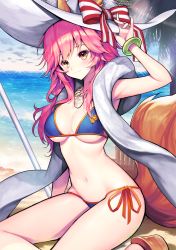 Rule 34 | 1girl, animal ears, beach, bikini, blue bikini, breasts, commentary request, day, fate/grand order, fate (series), fox ears, fox tail, hat, highres, jewelry, kneeling, kyundoo, large breasts, long hair, looking at viewer, navel, necklace, orange eyes, outdoors, pink hair, side-tie bikini bottom, smile, solo, straw hat, string bikini, swimsuit, tail, tamamo (fate), tamamo no mae (fate/extra), tamamo no mae (swimsuit lancer) (fate), tamamo no mae (swimsuit lancer) (third ascension) (fate), tooth necklace, water, wristband