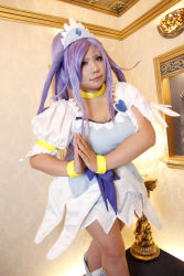 Rule 34 | 1girl, ankle boots, asian, blue eyes, blue hair, boots, bow, bracelet, breasts, choker, chouzuki maryou, cosplay, cure diamond, cure diamond (cosplay), dokidoki! precure, dress, headpiece, highres, jewelry, large breasts, crossed legs, long hair, magical girl, matching hair/eyes, own hands together, photo (medium), plump, ponytail, precure, puffy short sleeves, puffy sleeves, ribbon, short sleeves, solo, tiara