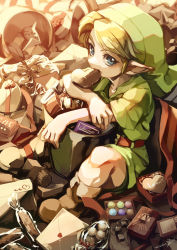 Rule 34 | 1boy, bag, belt, blonde hair, blue eyes, boots, brown belt, brown footwear, candy, chocolate, chocolate heart, commentary request, food, green hat, green shirt, hat, heart, highres, in mouth, kandori makoto, link, looking at viewer, male focus, mouth hold, nintendo, pointy ears, shirt, short sleeves, shorts, sitting, solo, the legend of zelda, the legend of zelda: majora&#039;s mask, weapon