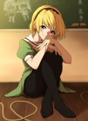 1girl black_hairband black_pantyhose blonde_hair blurry blurry_background blush closed_mouth crossed_ankles dress eyes_visible_through_hair film_grain full_body green_dress hair_between_eyes hairband head_tilt highres higurashi_no_naku_koro_ni houjou_satoko hugging_own_legs indoors knees_up looking_at_viewer no_shoes pantyhose poyadevil puffy_short_sleeves puffy_sleeves purple_eyes rope sailor_collar sailor_dress short_dress short_hair short_sleeves sidelighting sitting smile solo tareme white_sailor_collar