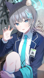Rule 34 | 1girl, absurdres, alternate hairstyle, animal ear fluff, animal ears, black jacket, black nails, blue archive, blue eyes, blue halo, blue necktie, blush, collared shirt, cross hair ornament, extra ears, fang, fingernails, grey hair, hair ornament, halo, highres, id card, jacket, kneehighs, long sleeves, looking at viewer, mismatched pupils, momomoi momoi, nail polish, necktie, open mouth, shiroko (blue archive), shirt, short hair, skin fang, socks, solo, white shirt, white socks, wolf ears
