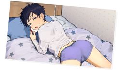 Rule 34 | 1boy, ass, bed, black hair, blanket, blue eyes, boxer briefs, cable, cellphone, head tilt, highres, holding, holding phone, long sleeves, looking at viewer, lying, male focus, male underwear, on stomach, original, parted lips, phone, pillow, pillow (nutsfool), shirt, smartphone, solo, star (symbol), star print, underwear, white shirt