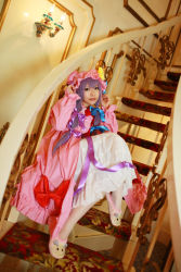 Rule 34 | 1girl, asian, cosplay, crescent, dress, female focus, hat, highres, long hair, patchouli knowledge, photo (medium), purple hair, solo, stairs, tenshi myu, touhou