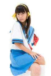 Rule 34 | 1girl, ai-chan (idol), armband, asian, brown hair, cosplay, highres, looking at viewer, photo (medium), school uniform, simple background, skirt, solo, suzumiya haruhi, suzumiya haruhi (cosplay), suzumiya haruhi no yuuutsu, white background