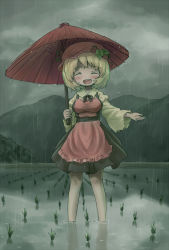 Rule 34 | 1girl, aki minoriko, arinu, bare legs, black skirt, blonde hair, blush, breasts, cloud, cloudy sky, commentary request, facing viewer, hat, highres, holding, holding umbrella, large breasts, long sleeves, oil-paper umbrella, open mouth, outdoors, outstretched arm, rain, red hat, rice paddy, skirt, sky, smile, solo, standing, touhou, umbrella, wading, water, wide sleeves