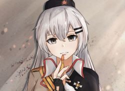 Rule 34 | 1girl, black cloak, black gloves, black hat, blank eyes, breasts, brown jacket, bullet, cloak, finger to mouth, fingerless gloves, girls&#039; frontline, gloves, grey eyes, grey hair, hair ornament, hairclip, hat, highres, holding, holding bullet, jacket, jewelry, long hair, looking at viewer, low twintails, medium breasts, military hat, muteppona hito, red star, ring, simple background, solo, standing, star (symbol), svd (girls&#039; frontline), twintails, wall, wedding band