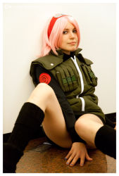 Rule 34 | 1girl, boots, cosplay, flak jacket, haruno sakura, jacket, legs, naruto, naruto (series), photo (medium), pink hair, short hair, smile, solo, thighs