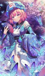 Rule 34 | 1girl, bare shoulders, blue hat, blue kimono, bug, butterfly, cherry blossoms, detached sleeves, floral print, folding fan, hand fan, hat, highres, holding, holding fan, insect, japanese clothes, kimono, kiramarukou, looking at viewer, mob cap, pink eyes, pink hair, saigyouji yuyuko, short hair, smile, solo, standing, touhou, triangular headpiece, wide sleeves
