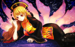 Rule 34 | 1girl, black dress, blonde hair, chinese clothes, crescent moon, dress, fox tail, hair between eyes, hat, junko (touhou), long hair, long sleeves, looking at viewer, lying, moon, multiple tails, natsume k, on side, red eyes, sash, simple background, smile, solo, tabard, tail, touhou, wide sleeves