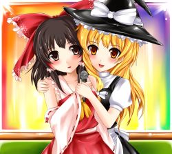 Rule 34 | 2girls, bad id, bad pixiv id, blonde hair, brown eyes, brown hair, detached sleeves, female focus, hakurei reimu, highres, japanese clothes, kirisame marisa, microphone, miko, multiple girls, touhou, yellow eyes, yoshimo