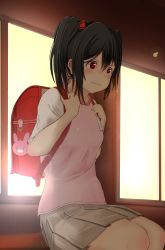 1girl absurdres backpack bag bag_charm black_hair blush charm_(object) female_focus grey_skirt highres indoors love_live! love_live!_school_idol_project panaham parted_lips randoseru red_eyes shirt sitting skirt solo t-shirt yazawa_nico