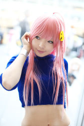 Rule 34 | 1girl, adjusting hair, asian, blue eyes, blurry, braid, breasts, color contacts, cosplay, depth of field, head tilt, indoors, light smile, looking to the side, makeup, mascara, midriff, namada, nono (top wo nerae 2!), photo (medium), pink hair, side braid, sidelocks, small breasts, solo, standing, sweater, top wo nerae 2!