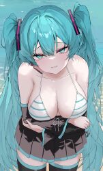 1girl absurdres aqua_eyes aqua_hair aqua_trim arm_tattoo bare_shoulders beach bikini bikini_top_only black_skirt breasts cleavage collarbone cowboy_shot crossed_arms detached_sleeves eikawa_suru front-tie_bikini_top front-tie_top grin hair_between_eyes hatsune_miku highres leaning_forward long_hair looking_at_viewer medium_breasts microphone no_nose parted_lips pleated_skirt skirt smile solo standing striped_bikini striped_clothes swimsuit tattoo thighhighs twintails very_long_hair vocaloid zettai_ryouiki