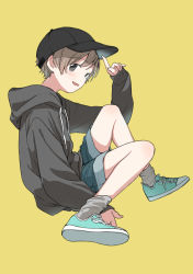 Rule 34 | 1boy, absurdres, brown hair, child, hat, highres, hood, hoodie, male focus, original, piko (pixiv), shoes, short hair, shorts, simple background, sitting, solo, yellow background