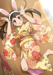 Rule 34 | 1girl, :o, animal ears, arms up, bandaid, bandaid on knee, bandaid on leg, blush, brown eyes, chinese zodiac, commentary, drawn whiskers, facepaint, fake animal ears, floral print, furisode, gesugesu ahoaho, hachikuji mayoi, hagoita, hairband, highres, japanese clothes, kimono, lens flare, lying, monogatari (series), new year, obi, on back, on floor, paddle, rabbit ears, rabbit pose, raised eyebrows, red sash, sash, short bangs, short eyebrows, short twintails, solo, sunlight, twintails, white hairband, wide sleeves, wooden floor, year of the rabbit, yellow kimono