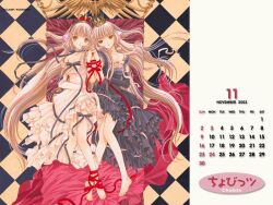 Rule 34 | 00s, 2003, 2girls, bed, brown eyes, calendar, calendar (medium), chobits, clamp, freya (chobits), from above, multiple girls, official art, ribbon, scan, wrapped up, yuri