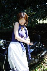 Rule 34 | 1girl, asian, dress, highres, hoshino aki, japanese (nationality), looking at viewer, motor vehicle, outdoors, photo (medium), scarf, scooter, solo, strapless, strapless dress, vehicle