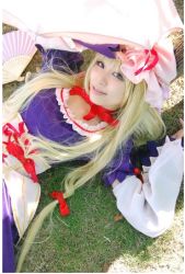 Rule 34 | blonde hair, bow, cosplay, cosplay photo, female focus, hat, lowres, photo (medium), solo, touhou, yakumo yukari, yakumo yukari (cosplay)