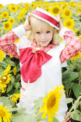 Rule 34 | 1girl, apron, ashita no nadja, asian, blonde hair, blurry, boater hat, bow, cosplay, depth of field, flower, frills, hat, kipi-san, long hair, looking at viewer, mole, nadja applefield, nadja applefield (cosplay), outdoors, photo (medium), solo, standing, sunflower