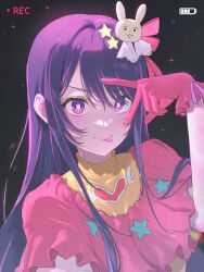Rule 34 | 1girl, battery indicator, blush, brooch, chromatic aberration, closed mouth, dinwoon, dress, film grain, frilled dress, frilled gloves, frills, gloves, hair between eyes, hair ornament, hair ribbon, hand up, heart, heart brooch, highres, hoshino ai (oshi no ko), idol, idol clothes, jewelry, long hair, looking at viewer, multicolored hair, oshi no ko, pink dress, pink gloves, pink hair, pink ribbon, purple eyes, purple hair, rabbit hair ornament, recording, ribbon, sidelocks, smile, solo, sparkle, star-shaped pupils, star (symbol), star hair ornament, streaked hair, symbol-shaped pupils, tongue, tongue out, turtleneck, turtleneck dress, two-tone dress, upper body, v over eye, yellow dress