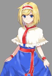 Rule 34 | 1girl, alice margatroid, blonde hair, blue dress, blue eyes, capelet, dress, grey background, hairband, looking at viewer, necktie, ribbon, sash, short hair, simple background, skirt hold, smile, solo, taiki (ozone), touhou, turtleneck, wrist cuffs