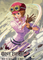Rule 34 | 1girl, black thighhighs, blue eyes, brown gloves, copyright name, dust cloud, english text, frilled shirt, frills, gloves, goggles, goggles on headwear, hat, koala (one piece), light brown hair, newsboy cap, one piece, one piece card game, open mouth, otton, pink shirt, red hat, red skirt, shirt, short hair, skirt, smoke, solo, teeth, thighhighs, upper teeth only