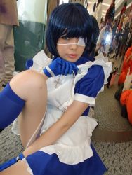 Rule 34 | 1girl, apron, asian, blue eyes, blue gloves, blue hair, blue socks, boots, collar, color contacts, cosplay, cross, cuffs, dutch angle, eyepatch, gloves, handcuffs, ikkitousen, indoors, kneehighs, looking at viewer, maid, maid apron, namada, on floor, photo (medium), puffy short sleeves, puffy sleeves, reflection, ryomou shimei, ryomou shimei (cosplay), short sleeves, sitting, socks, solo focus