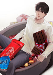 Rule 34 | 1boy, absurdres, black eyes, black hair, blurry, candy, closed mouth, depth of field, expressionless, feet out of frame, food, gift, highres, in bowl, in container, kitkat, looking at viewer, male focus, minimized, original, ppang sik, red ribbon, ribbon, short hair, sitting, solo, sweater, white sweater