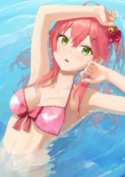 Rule 34 | 1girl, ahoge, arm up, asymmetrical hair, bell, bikini, blush, breasts, cleavage, commentary, green eyes, hair bell, hair between eyes, hair ornament, halterneck, highres, hololive, long hair, looking at viewer, makimaki makky7, medium breasts, navel, open mouth, partially submerged, pink bikini, pink hair, sakura miko, sakura miko (hololive summer 2019), side ponytail, sidelocks, solo, stomach, swimsuit, upper body, virtual youtuber, water, x hair ornament