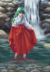 Rule 34 | 1girl, alternate costume, backlighting, breasts, clothes lift, commentary request, day, frog hair ornament, green eyes, green hair, hair ornament, hair tubes, highres, japanese clothes, kochiya sanae, large breasts, long hair, long skirt, long sleeves, miko, red skirt, reflection, rock, sasurai no kuchibuefuki, shirt, skirt, skirt lift, smile, snake hair ornament, solo, touhou, very long hair, wading, water, waterfall, wet, wet clothes, white shirt