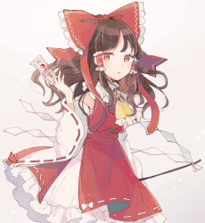 Rule 34 | 1girl, :o, ascot, bare shoulders, between fingers, bow, breasts, brown eyes, brown hair, cowboy shot, detached sleeves, dress, gohei, grey background, hair bow, hair tubes, hakurei reimu, holding, holding stick, long hair, looking at viewer, medium breasts, mozukuzu (manukedori), ofuda, ofuda between fingers, petticoat, red bow, red dress, simple background, solo, standing, stick, touhou, wide sleeves, yellow ascot
