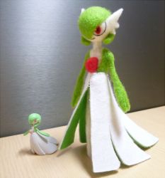 Rule 34 | 1girl, bob cut, closed mouth, colored skin, creatures (company), doll, female focus, figure, flat chest, full body, game freak, gardevoir, gen 3 pokemon, green hair, green skin, hair over one eye, indoors, lotosu, multicolored skin, multiple views, nintendo, photo (medium), pokemon, pokemon (creature), red eyes, short hair, standing, stuffed toy, two-tone skin, unconventional media, white skin