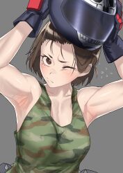 1girl armpits arms_up bare_shoulders breasts brown_eyes brown_hair camouflage camouflage_shirt camouflage_tank_top capcom flying_sweatdrops gloves grey_background haishima_xv helmet highres kazama_akira medium_breasts motorcycle_helmet one_eye_closed removing_helmet shirt short_hair simple_background solo street_fighter street_fighter_v sweat tank_top