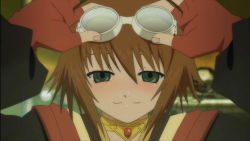 Rule 34 | 00s, 1girl, adjusting goggles, blush, brown hair, empty eyes, fingerless gloves, gloves, goggles, goggles on head, green eyes, looking at viewer, red gloves, rita mordio, short hair, solo, tales of (series), tales of vesperia