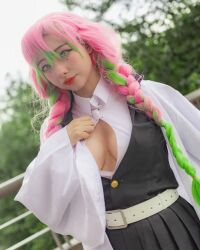 Rule 34 | 1girl, blurry, blurry background, breasts, cleavage, cosplay, demon slayer uniform, female focus, green eyes, green hair, highres, kanroji mitsuri, kanroji mitsuri (cosplay), kimetsu no yaiba, large breasts, long hair, looking at viewer, mexican (nationality), multicolored hair, outdoors, oz cosplay, photo (medium), pink hair, solo