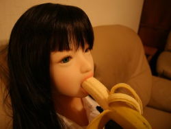 Rule 34 | 1girl, asian, banana, black hair, doll, food, fruit, object insertion, open mouth, photo (medium)