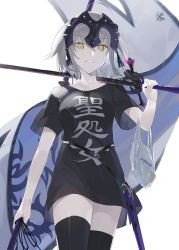 Rule 34 | 1girl, bag, black shirt, blonde hair, breasts, clothes writing, fate/grand order, fate (series), flag, hayashi kewi, headpiece, jeanne d&#039;arc (fate), jeanne d&#039;arc (ruler) (fate), jeanne d&#039;arc alter (avenger) (fate), jeanne d&#039;arc alter (fate), looking at viewer, over shoulder, pale skin, plastic bag, shirt, sword, sword over shoulder, t-shirt, thighhighs, walking, weapon, weapon over shoulder, white background, yellow eyes