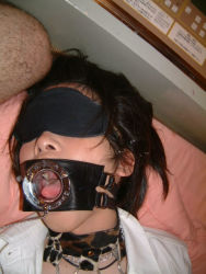 Rule 34 | 1girl, asian, blindfold, cum, gag, gagged, photo (medium), plug gag, ring gag, solo focus