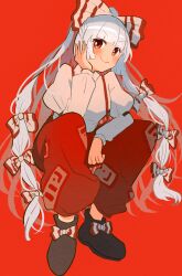 1girl absurdres booonyanyanya bow footwear_bow fujiwara_no_mokou full_body hair_bow hand_on_own_cheek hand_on_own_face highres long_hair looking_at_viewer pants red_background red_eyes red_pants red_theme shirt simple_background smug solo squatting suspender_pants touhou very_long_hair white_hair white_shirt