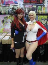 Rule 34 | 2girls, belt, blonde hair, breasts, cape, cleavage, cleavage cutout, clothing cutout, cosplay, dc comics, gloves, highres, leotard, multiple girls, photo (medium), power girl, power girl (cosplay)