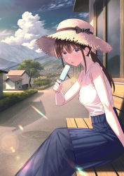 Rule 34 | 1girl, :o, bare shoulders, bench, blue eyes, blue skirt, brown hair, building, cloud, cloudy sky, food, frilled shirt, frills, hand up, hat, highres, holding, holding food, koh rd, long hair, long skirt, looking at viewer, mountain, open mouth, original, outdoors, ponytail, popsicle, shirt, sitting, skirt, sky, sleeveless, sleeveless shirt, solo, straw hat, sun hat, tree, white shirt