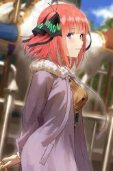 Rule 34 | 1girl, amusement park, arms behind back, blue eyes, blunt bangs, blush, breasts, brown shirt, butterfly hair ornament, carousel, coat, fagi (kakikaki), from side, go-toubun no hanayome, hair ornament, highres, holding, long sleeves, looking at viewer, looking to the side, medium breasts, nakano nino, one side up, open clothes, open coat, parted lips, pink hair, purple coat, shirt, short hair, smile, solo, upper body
