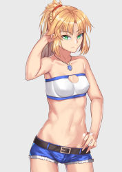Rule 34 | 1girl, arm behind head, bandeau, bare arms, bare shoulders, belt, black belt, blonde hair, blue shorts, braid, breasts, cleavage, cleavage cutout, clothing cutout, collarbone, commentary, cowboy shot, cutoffs, fate/apocrypha, fate (series), french braid, green eyes, grey background, groin, hair ornament, hair scrunchie, hand in own hair, hand on own hip, hand up, jewelry, long hair, looking at viewer, midriff, mordred (fate), mordred (fate/apocrypha), mordred (memories at trifas) (fate), navel, necklace, ponytail, red scrunchie, scrunchie, short shorts, shorts, sidelocks, simple background, small breasts, solo, standing, stomach, strapless, tube top, wujiemang