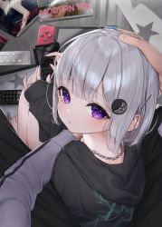 Rule 34 | 1boy, 1girl, barefoot, black hoodie, black pants, cellphone, commentary request, controller, ear piercing, grey hair, hair ornament, hairclip, headpat, highres, holding, holding phone, hood, hood down, hoodie, long sleeves, looking at viewer, looking back, magazine (object), mole, mole on neck, nintendo switch, original, pants, parted lips, phone, piercing, purple eyes, remote control, short hair, sitting, solo focus, star (symbol), tsukiman, x hair ornament