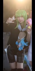 Rule 34 | 1girl, cosplay, digimon, female focus, green hair, highres, looking at viewer, photo (medium), real life, shinomiya rina, shinomiya rina (cosplay), smile, solo, v-mon