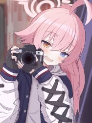 Rule 34 | 1girl, ahoge, black gloves, black jacket, blue archive, blue eyes, blush, camera, fang, fingerless gloves, fingernails, gloves, hair between eyes, halo, heterochromia, highres, holding, holding camera, hoshino (blue archive), jacket, kain501i, long hair, long sleeves, looking at viewer, open clothes, open jacket, open mouth, pink hair, pink halo, smile, solo, upper body, yellow eyes